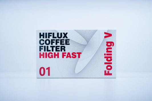 Frontal view of a white coffee filter package on a light background, featuring the text "HIFLUX COFFEE FILTER HIGH FAST", an abstract line pattern, the red number "01", and vertical text reading "Folding V
